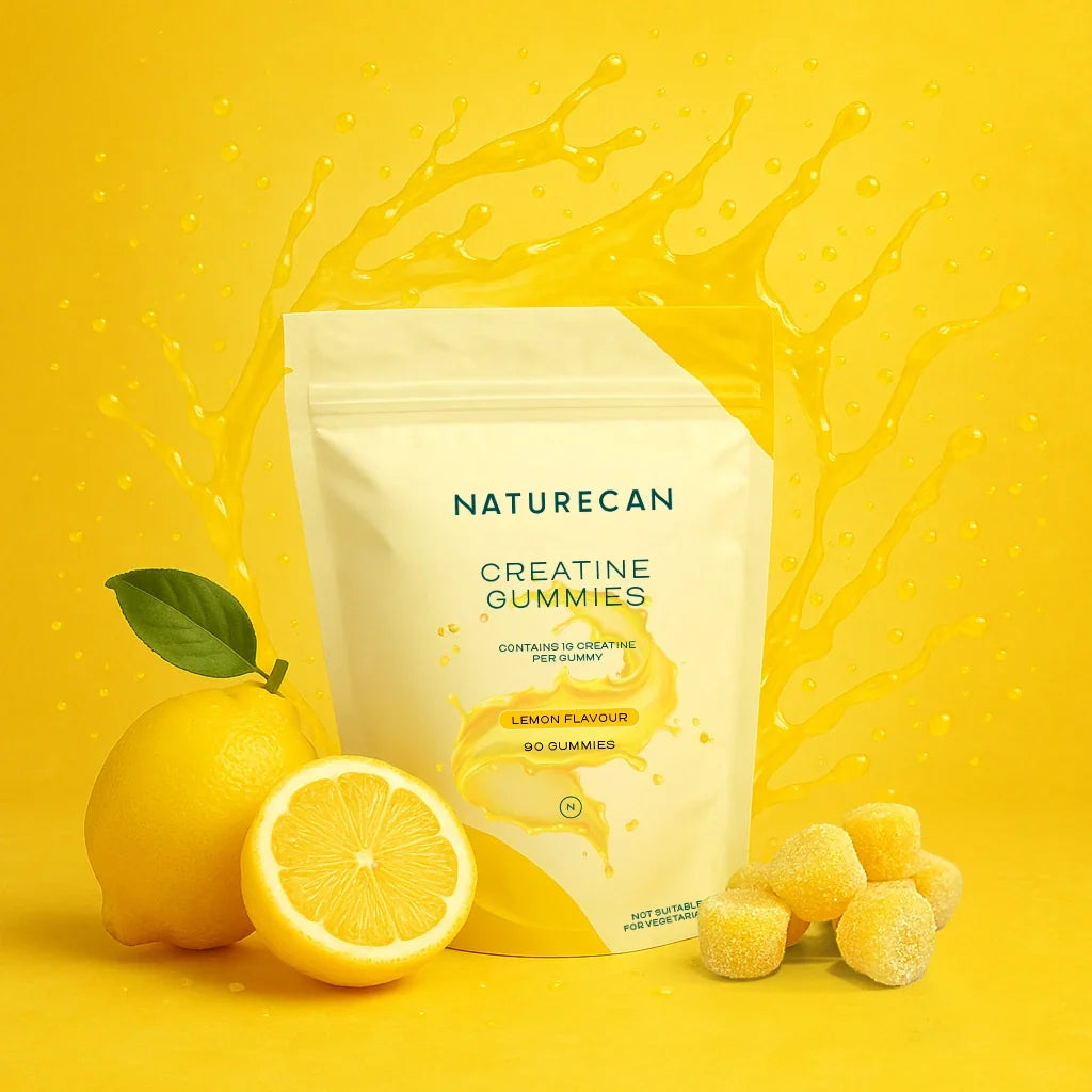 Naturecan Creatine Gummies lifestyle image – yellow background with fresh lemons and lemon juice splash beside the Lemon Flavour Creatine Gummies pouch
