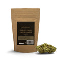 Naturecan Fresh Kase CBD Flower – kraft paper stand-up pouch with dark label, Fresh Kase CBD Flower less than 0.3% THC 10g, with a large CBD flower bud displayed beside it on white background