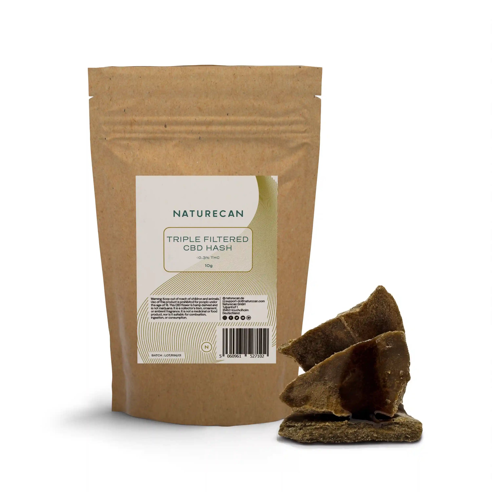 Naturecan Triple Filtered CBD Hash – kraft paper stand-up pouch with cream and gold label, Triple Filtered CBD Hash less than 0.3% THC 10g, with broken chunks of dark hash displayed beside it on white background