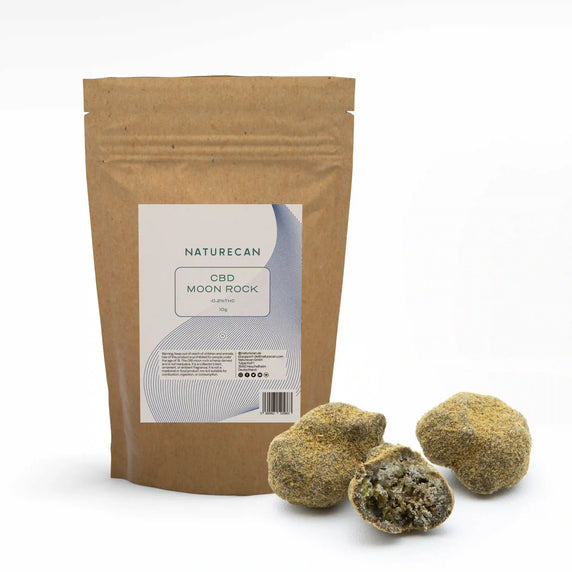 Naturecan CBD Moon Rock – kraft paper resealable pouch 10g, <0.2% THC, with three rounded dense CBD moon rock nuggets beside it