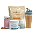Naturecan health and wellness products including protein powder, gummies, powder, and shaker on a white background

