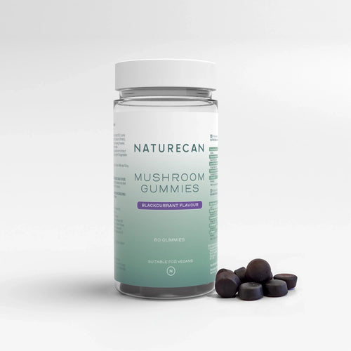 Naturecan Mushroom Gummies – clear bottle with teal label, Blackcurrant Flavour, 60 gummies, suitable for vegans, with round dark gummies beside it